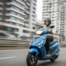 Hero Maestro Edge 125 running on road with rider
