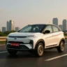 Tata Nexon compact SUV running on open highway showcasing design and safety
