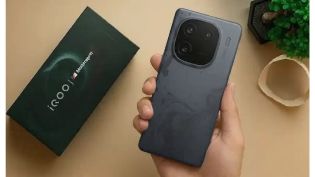 Rear camera setup of iQOO 15R 5G on a stylish desk.