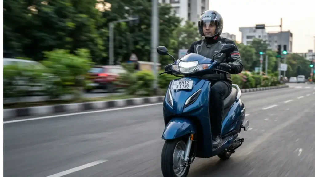 Honda Activa 6G running on a city road with a rider.