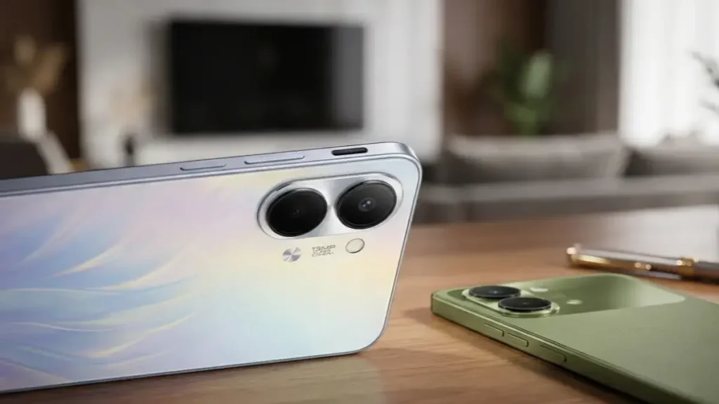 Rear camera and IR Blaster of Tecno Pop X on a stylish desk.