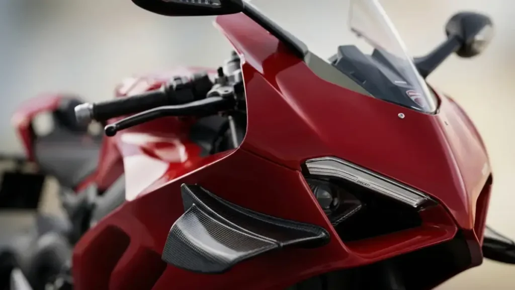 Close-up of New Ducati Panigale V4 front winglets and LED lights.