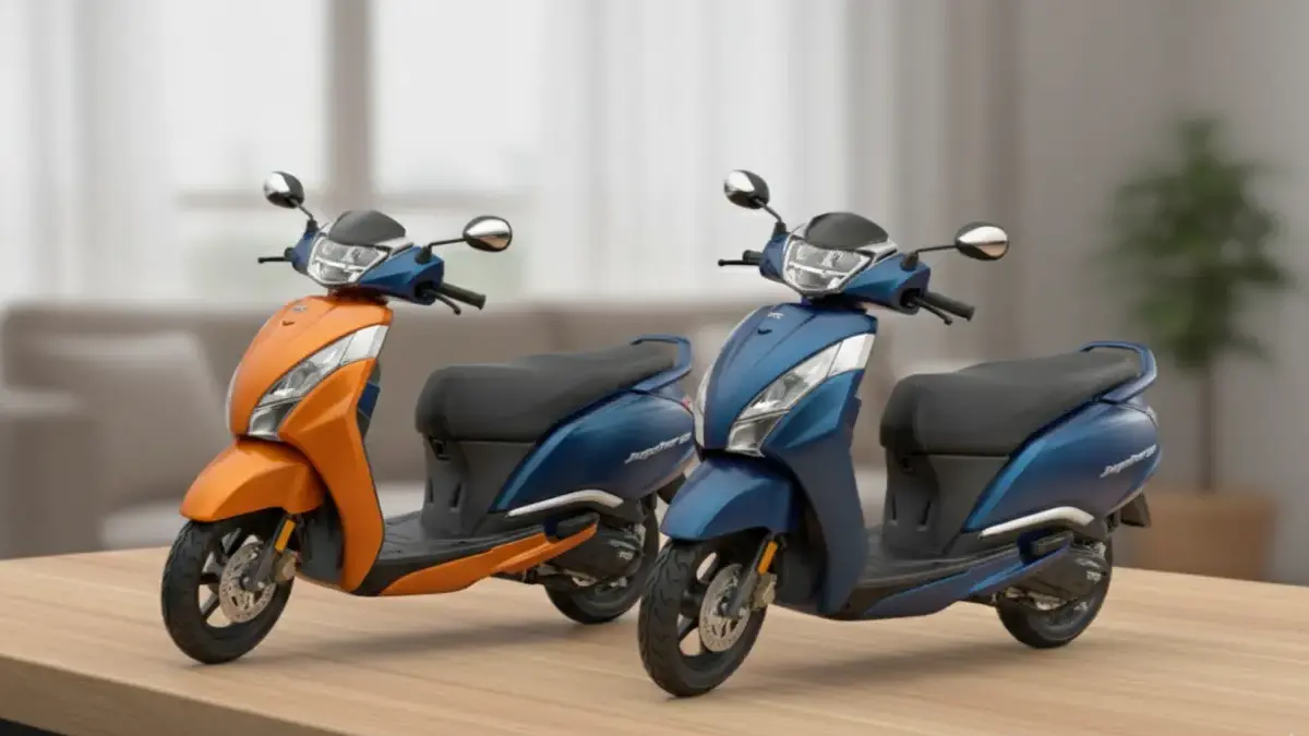 models of TVS Jupiter 125 on a stylish desk showcasing utility features.