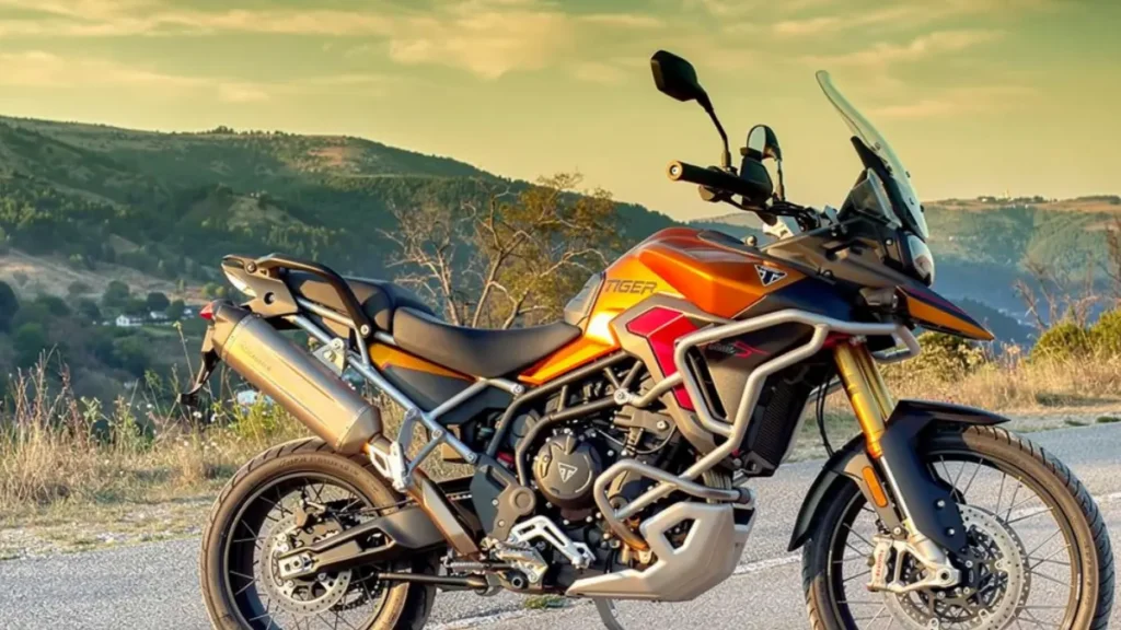 Close-up display of the premium Akrapovic exhaust system on Triumph Tiger 900 Alpine Edition.
