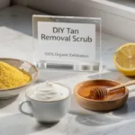 Besan, yogurt, honey, lemon, and coffee powder arranged on a stylish desk representing organic tan removal scrub ingredients.