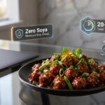A premium serving layout of hot crispy soya manchurian garnished with green scallions on a modern stylish desk workspace.